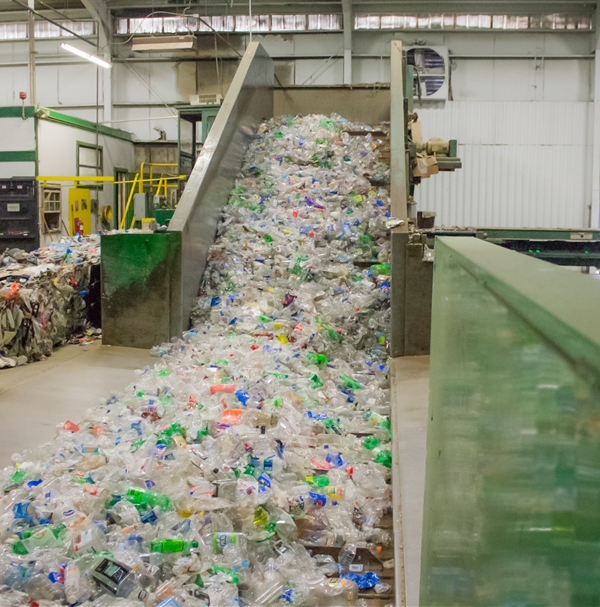 Plastic bottles being processed in TC Recycling facility.