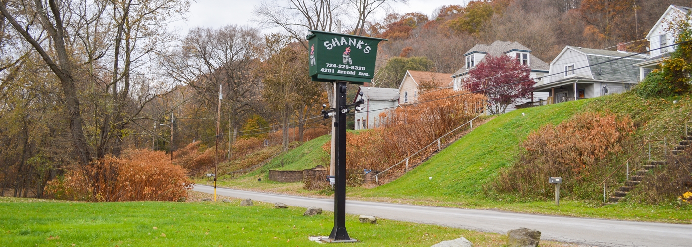 Shank Waste Service sign in Lower Burrell, PA.