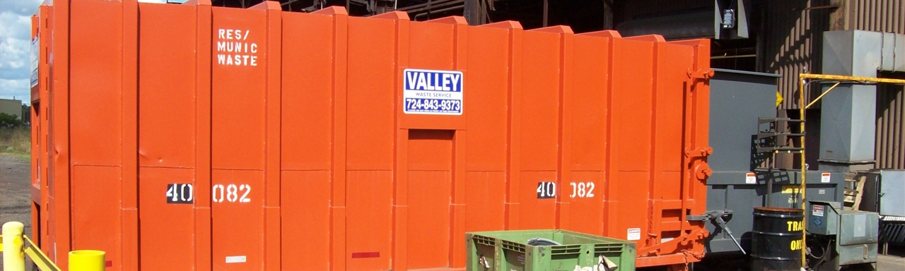 Valley Waste Service industrial trash compactor.
