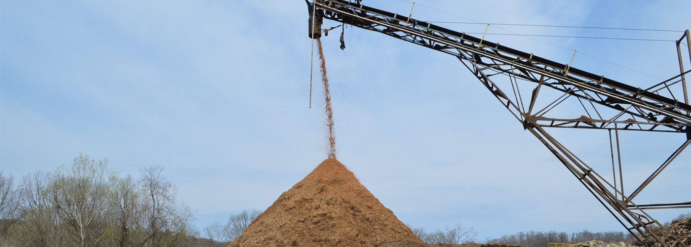 pile of mulch being processed at diamond mulch