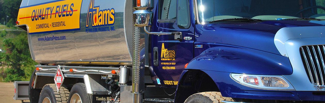 Close up of Adams Petroleum fueling truck.