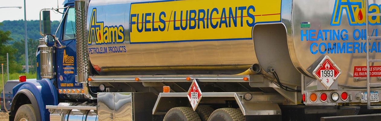 Close up of Adams Petroleum fueling truck.