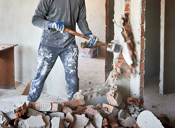 Construction debris with sledgehammer 