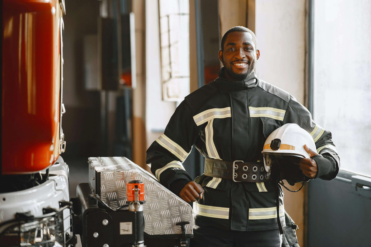 smiling fireman posing for picture