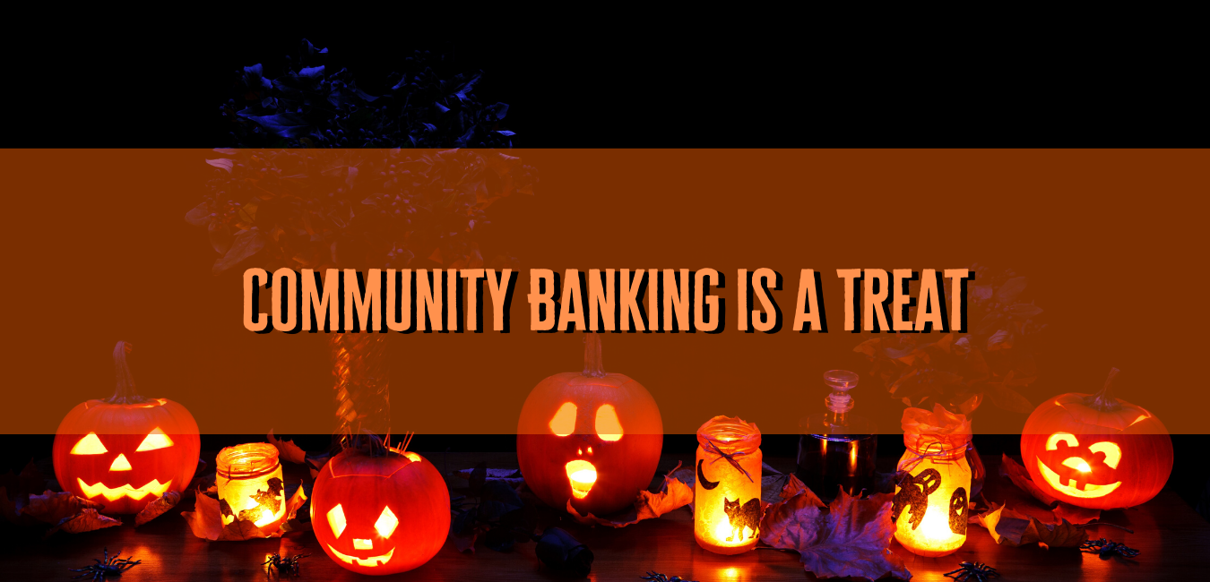 pumpkins with words "community banking is a treat"