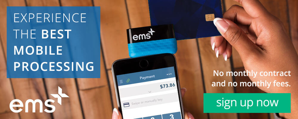 close up of an emsplus credit card reader attached to a smartphone