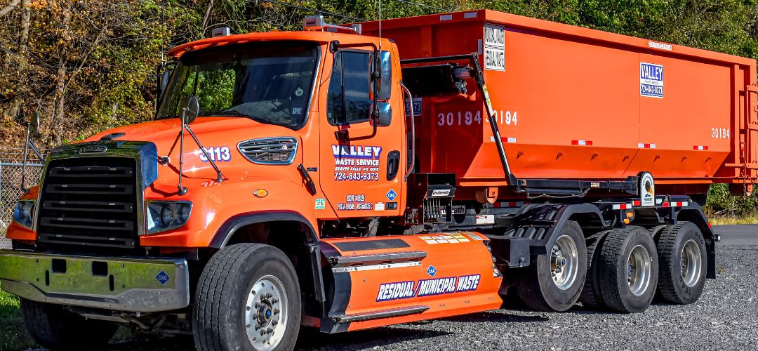 Valley Waste roll-off dumpster at a construction site.
