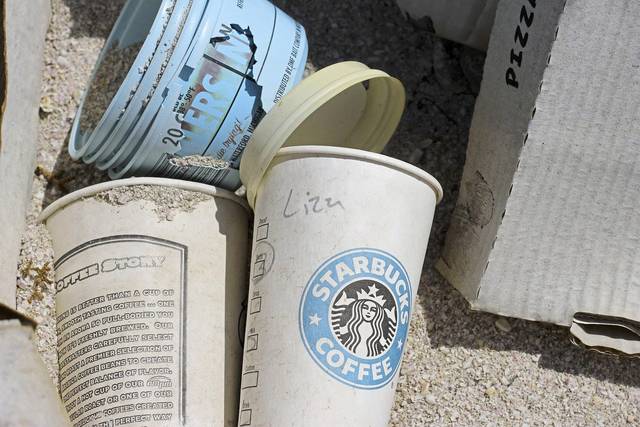 disposed of starbucks cup and other debris 